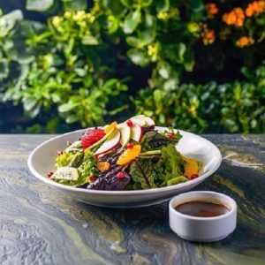 Fresh seasonal vegetable and fruit salad
